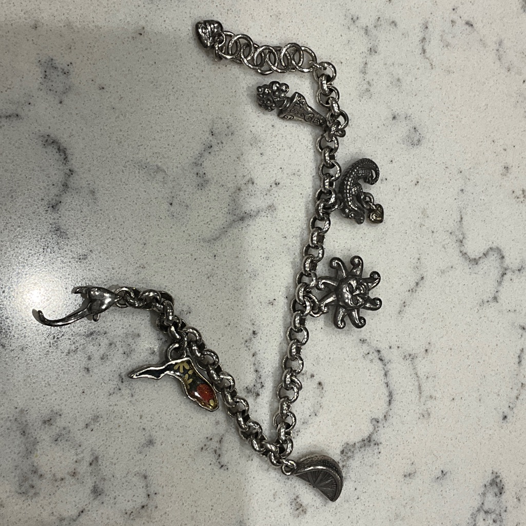 Brighton Silver Bracelet With Assorted Charms 35$